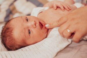 Baby being pointed to. 
